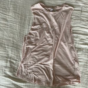 Loose light pink tank top. Size small.
